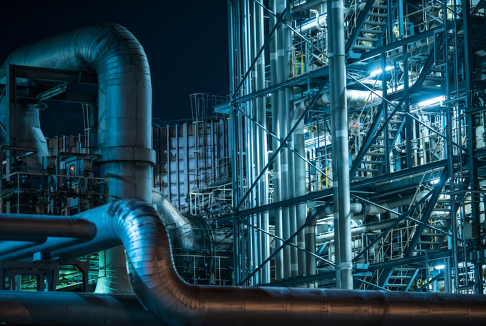 Details of large factory at night
